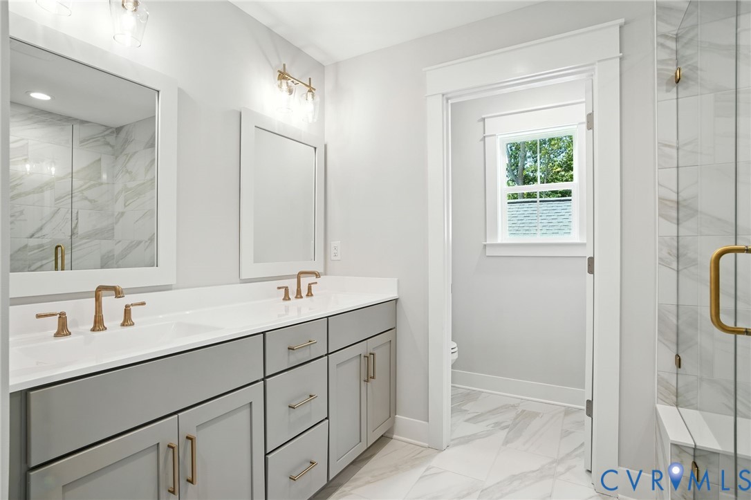 Tbd Lot 3 Rocky Ford Road Beaverdam, VA 23015 - Photo 22 of 40 a bathroom with 2 sink shower and a mirror