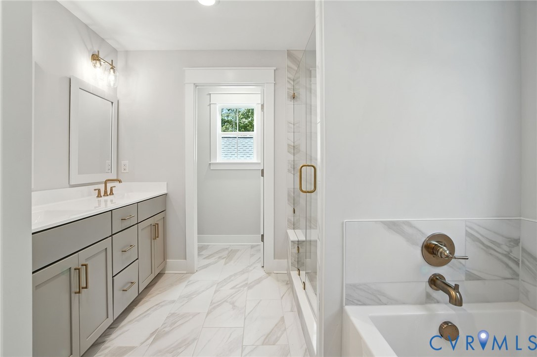 Tbd Lot 3 Rocky Ford Road Beaverdam, VA 23015 - Photo 24 of 40 a bathroom with a tub sink and mirror