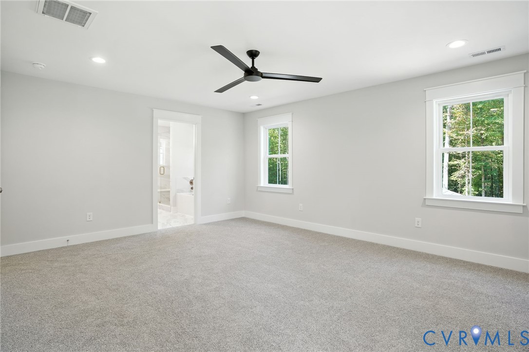 Tbd Lot 3 Rocky Ford Road Beaverdam, VA 23015 - Photo 25 of 40 an empty room with windows and ceiling fan