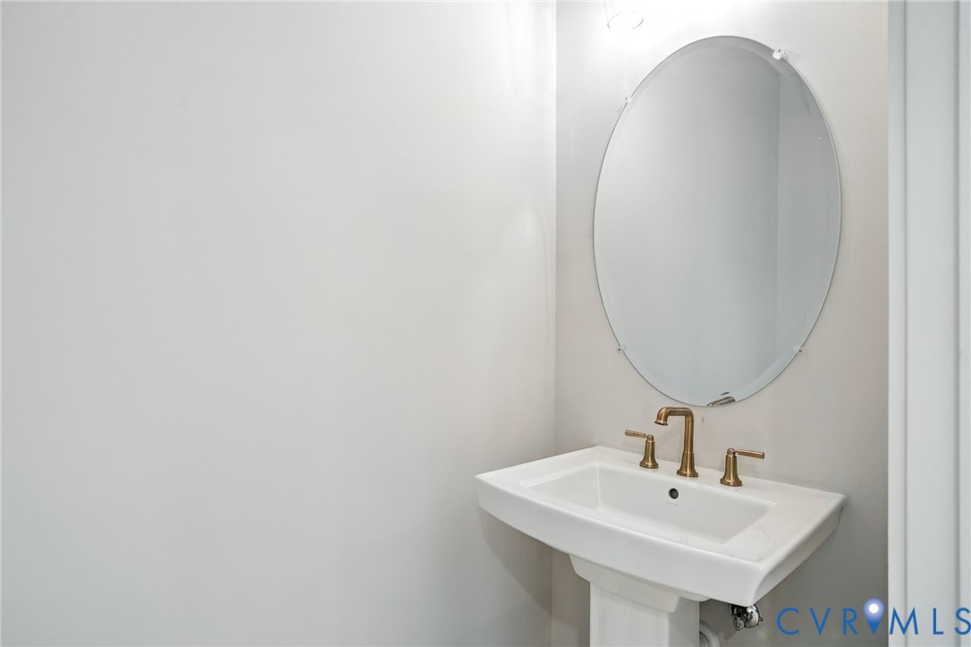 Tbd Lot 3 Rocky Ford Road Beaverdam, VA 23015 - Photo 34 of 40 a bathroom with a sink and a mirror