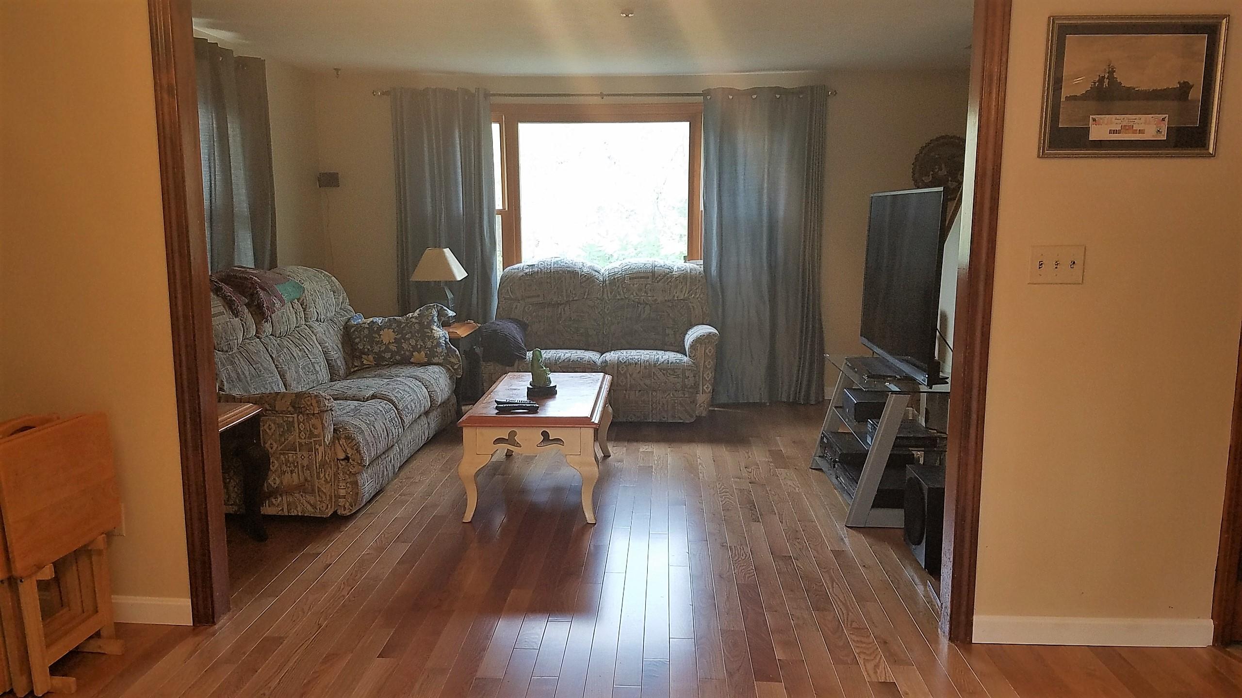 565 Shore Road Pocasset, MA 02559 - Photo 7 of 21 565 Shore LR HW floor front