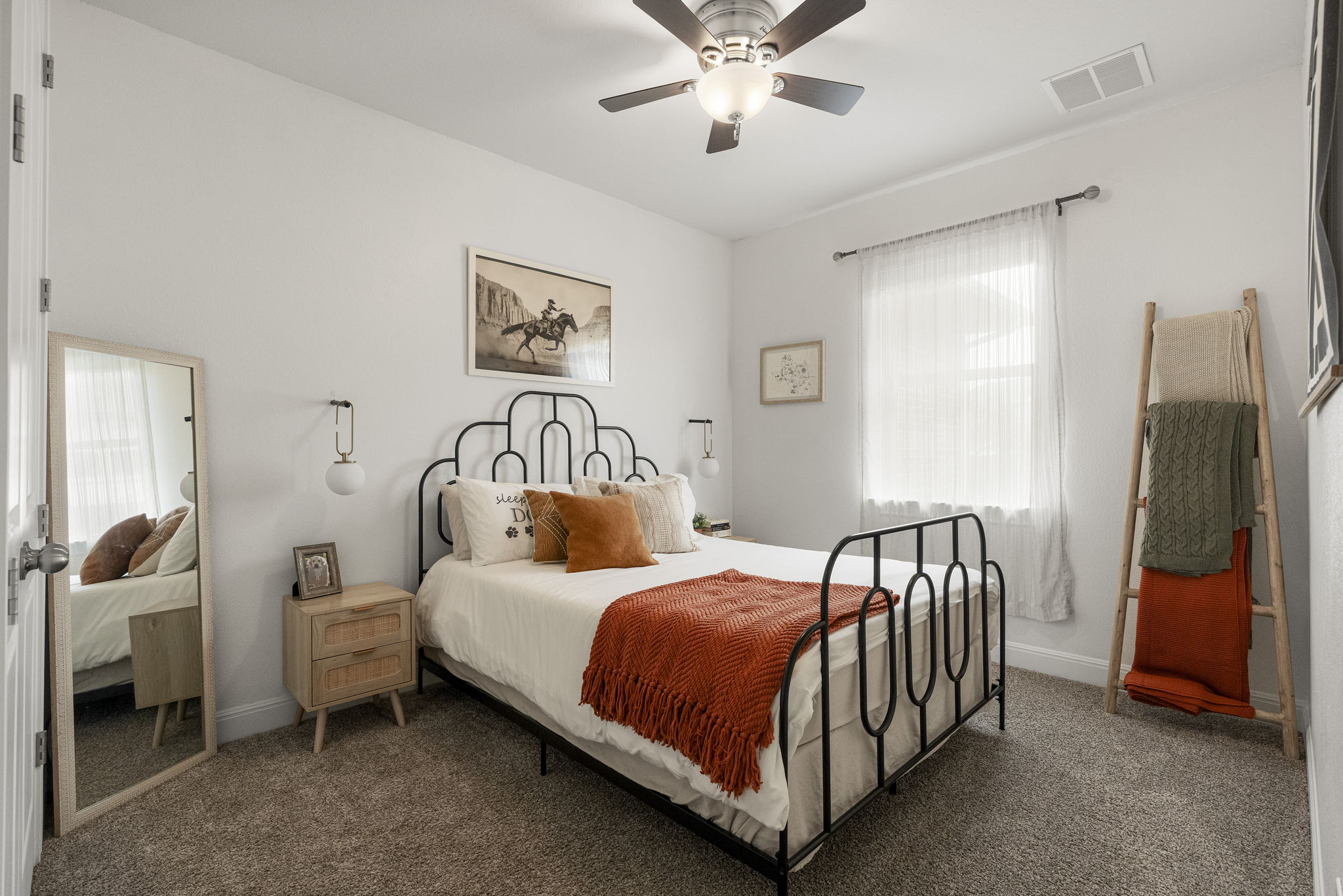 772 Founders Ridge Dripping Springs, TX 78620 - Photo 27 of 40 The secondary bedroom offers comfortable accommodations with abundant natural light and neutral finishes.