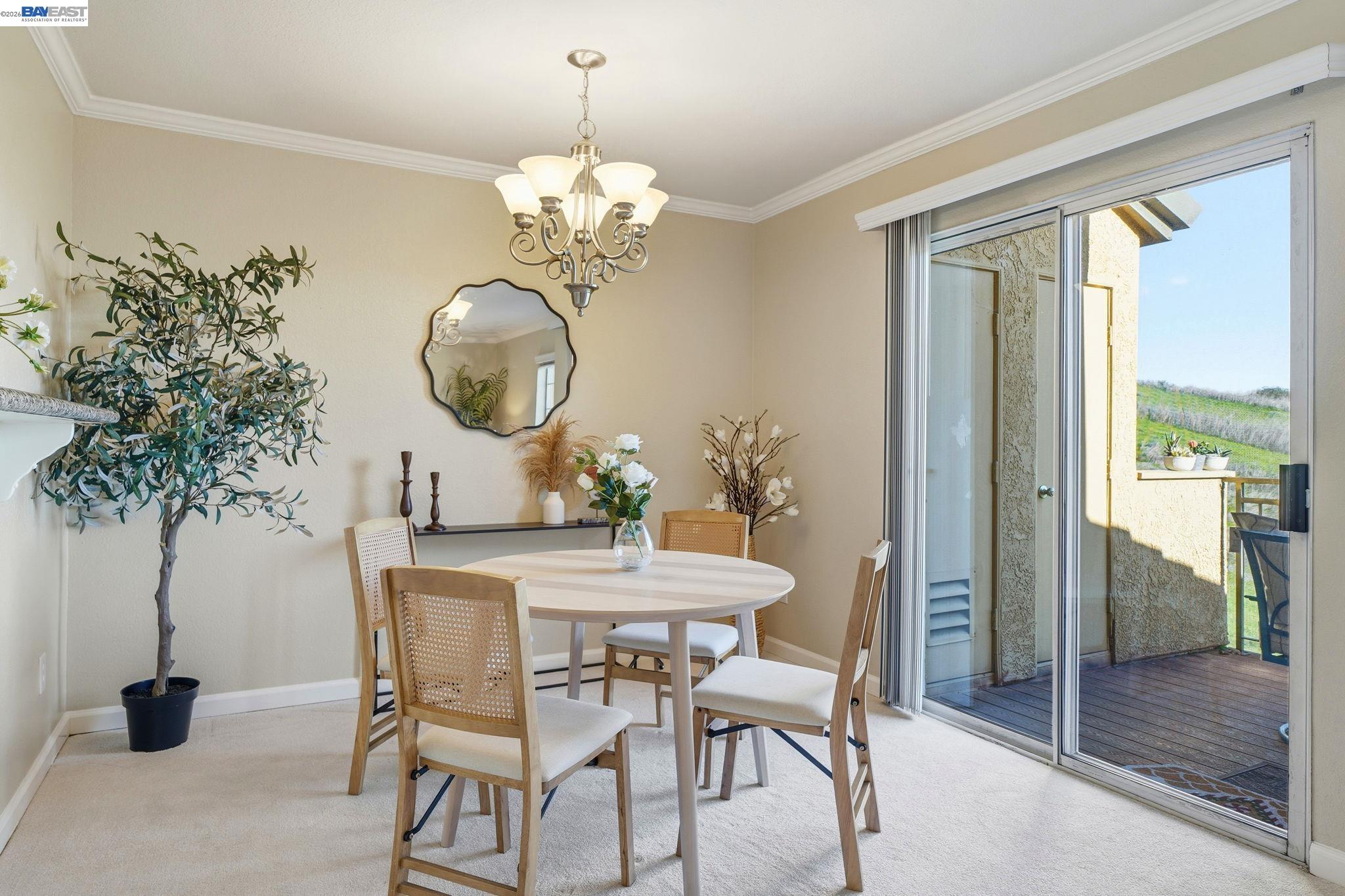 490 Bollinger Canyon Lane, Unit 367 San Ramon, CA 94582 - Photo 13 of 32 a view of a dining room with furniture and chandelier