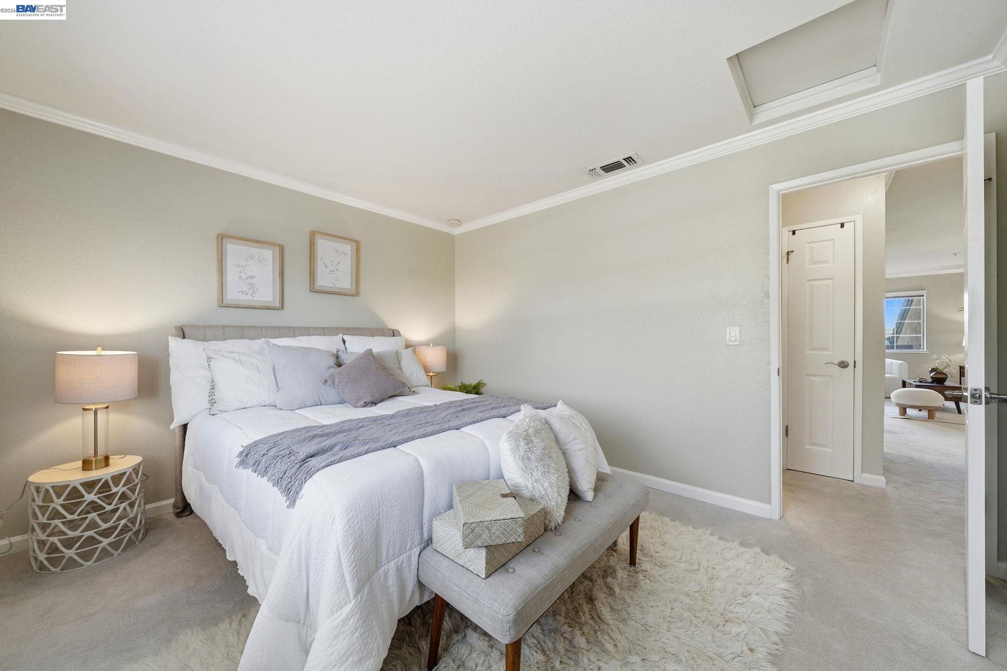 490 Bollinger Canyon Lane, Unit 367 San Ramon, CA 94582 - Photo 22 of 32 a bedroom with a bed and a table