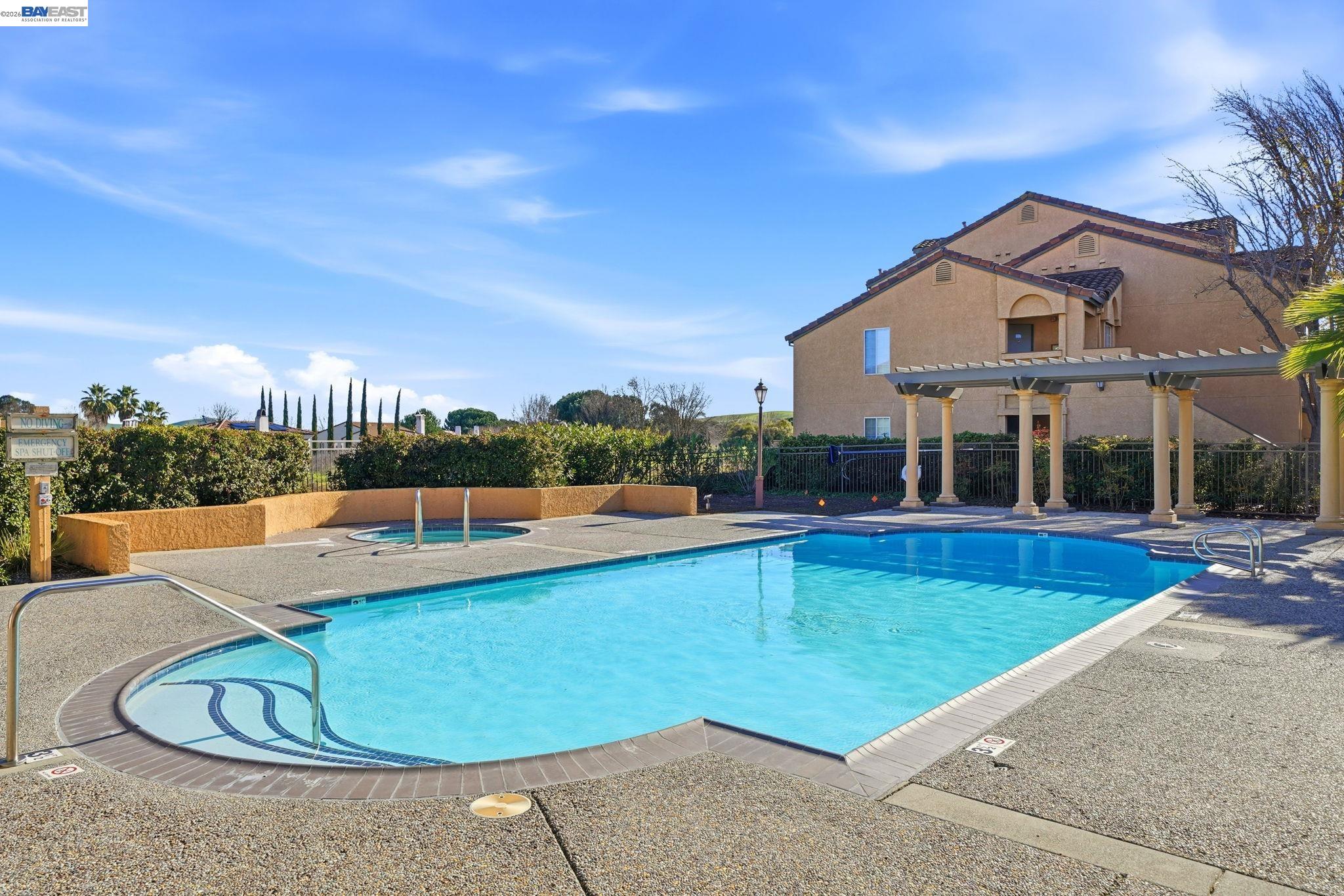 490 Bollinger Canyon Lane, Unit 367 San Ramon, CA 94582 - Photo 28 of 32 a view of a swimming pool with lounge chair