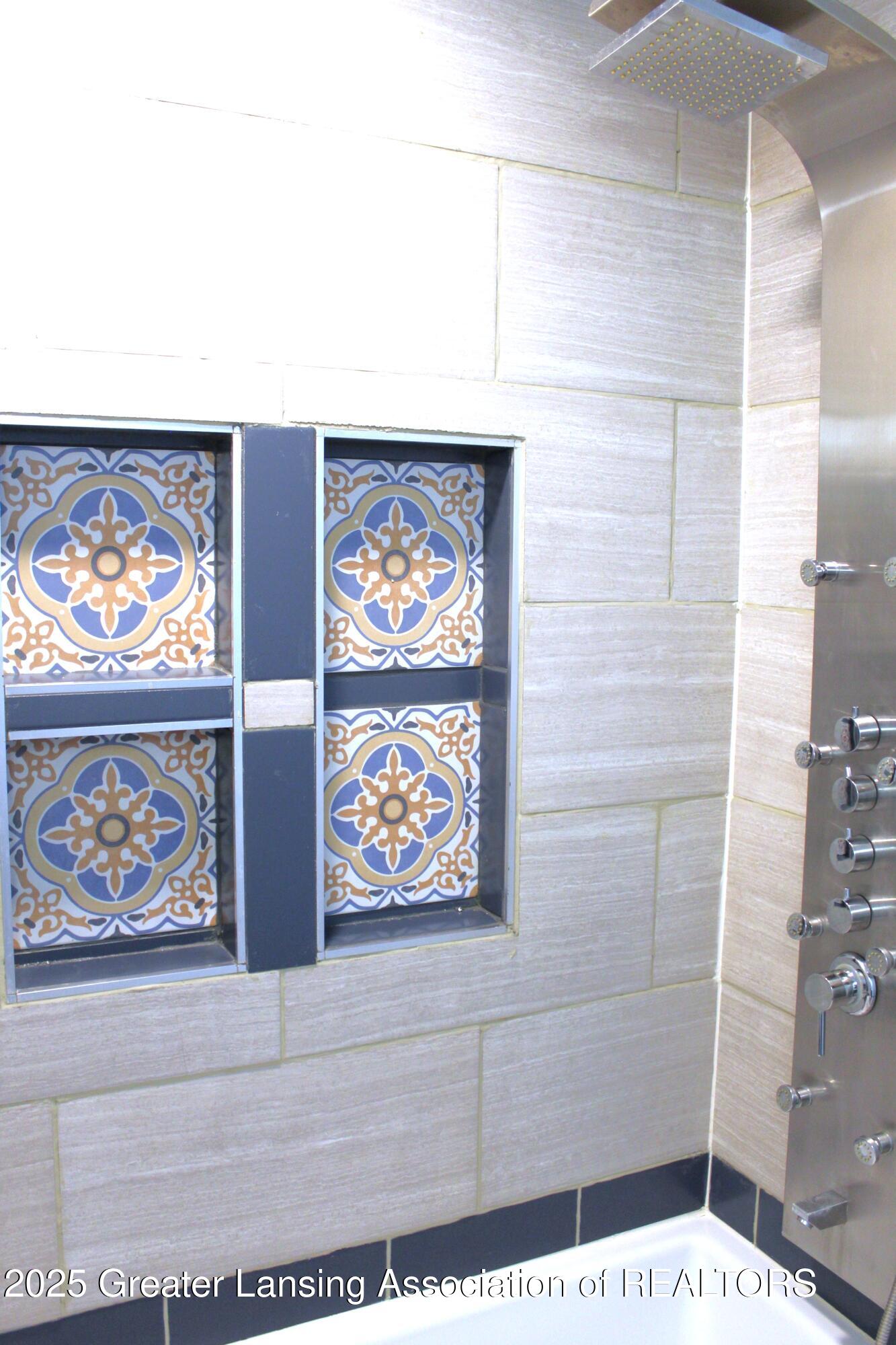 3922 Hunters Ridge Drive, Unit 3 Lansing, MI 48911 - Photo 19 of 44 spa shower