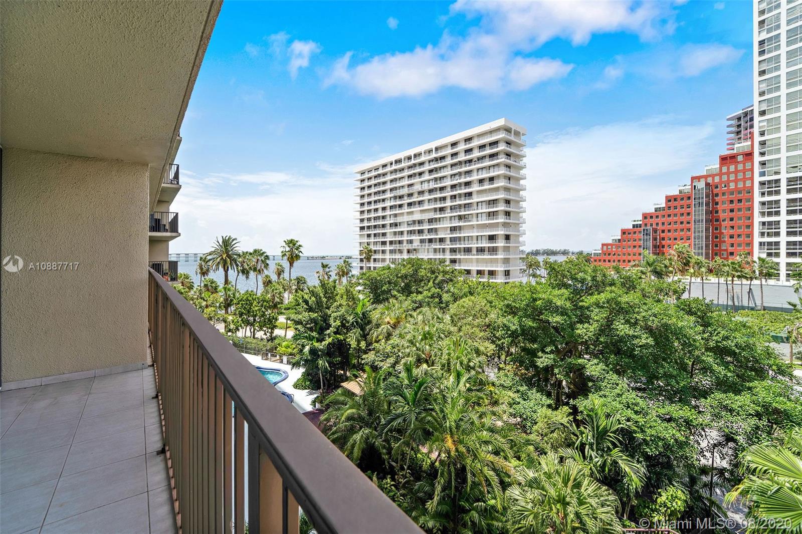 1450 Brickell Bay Drive, Unit 612 Miami, FL 33131 - Photo 12 of 25 a view of a balcony and trees