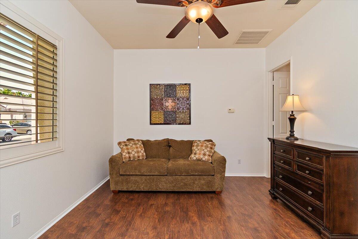 49580 Wayne Street Indio, CA 92201 - Photo 29 of 37 a living room with furniture and wooden floor