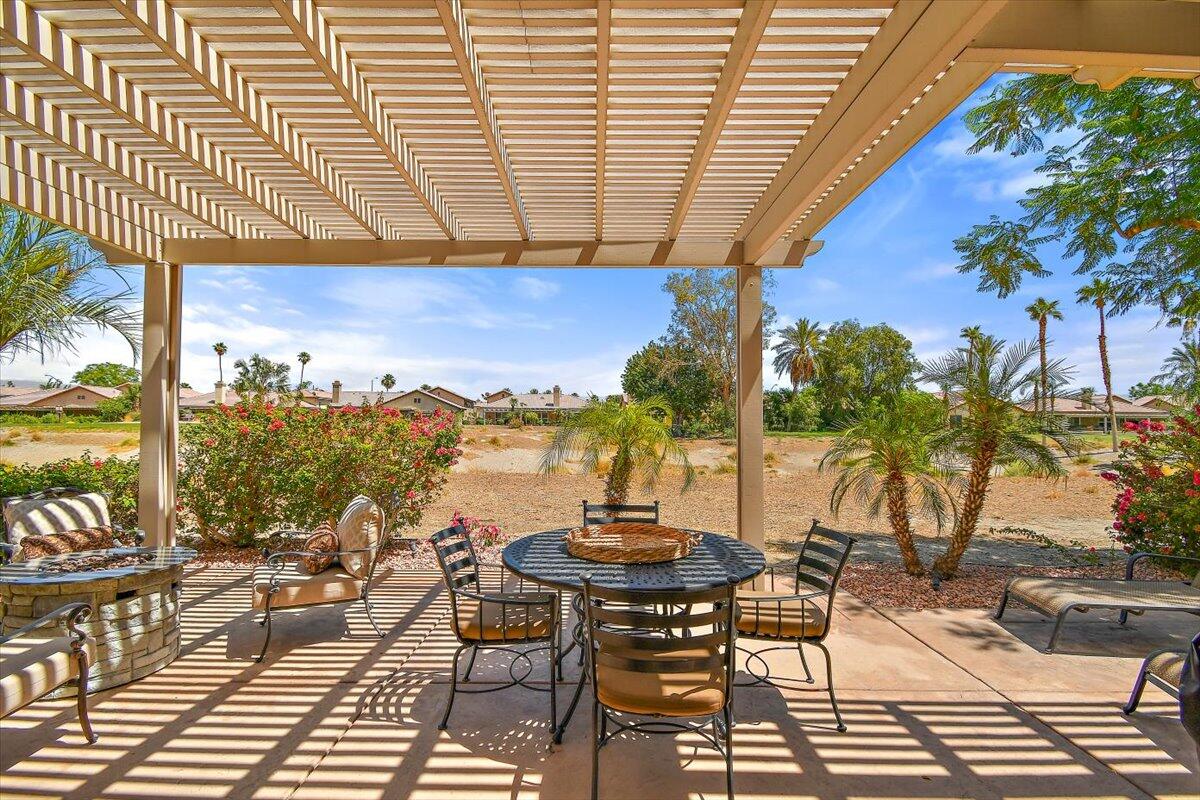 49580 Wayne Street Indio, CA 92201 - Photo 33 of 37 a view of a chairs and table in the patio