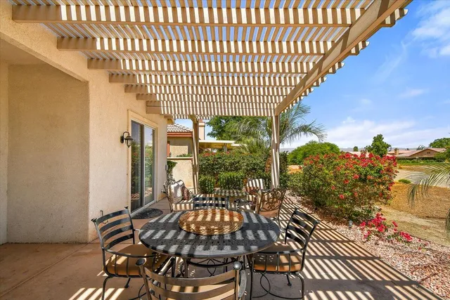 a view of balcony with furniture