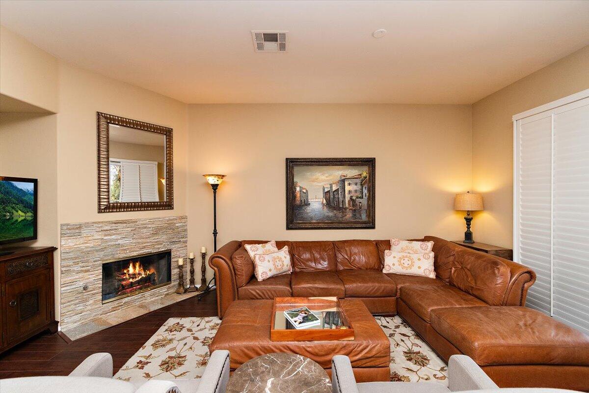 49580 Wayne Street Indio, CA 92201 - Photo 8 of 37 a living room with furniture and a fireplace