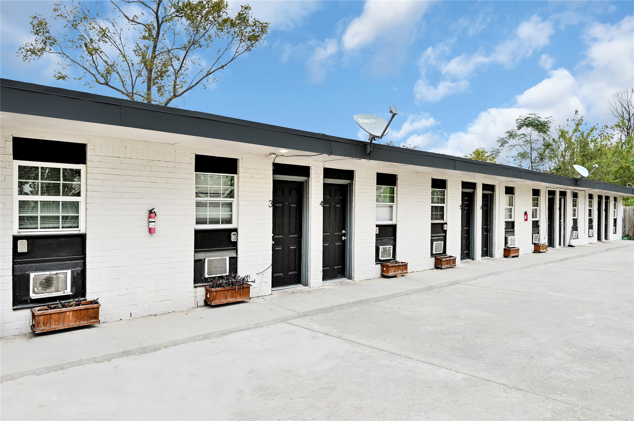 3714 Dabney Street, Unit 7 Houston, TX 77026 - Photo 14 of 15 a view of a building with car parked