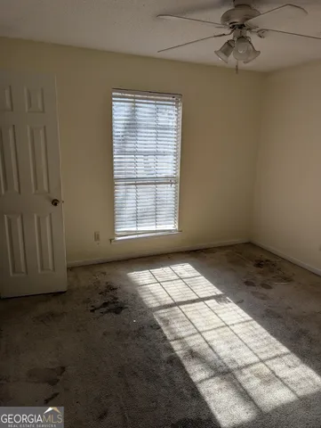 an empty room with windows