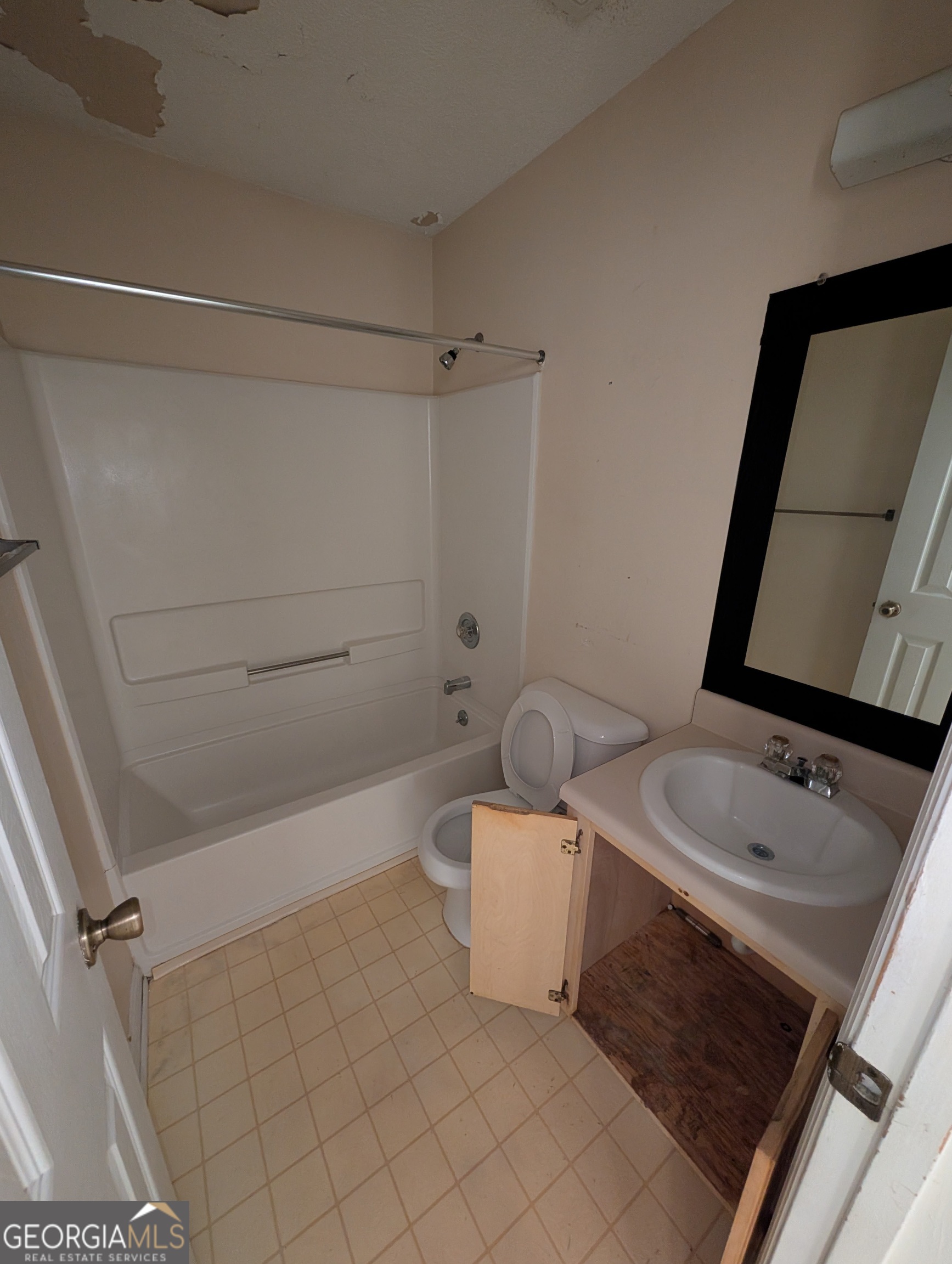 1934 Talmadge Road Allenhurst, GA 31301 - Photo 17 of 19 a bathroom with a sink a toilet and shower