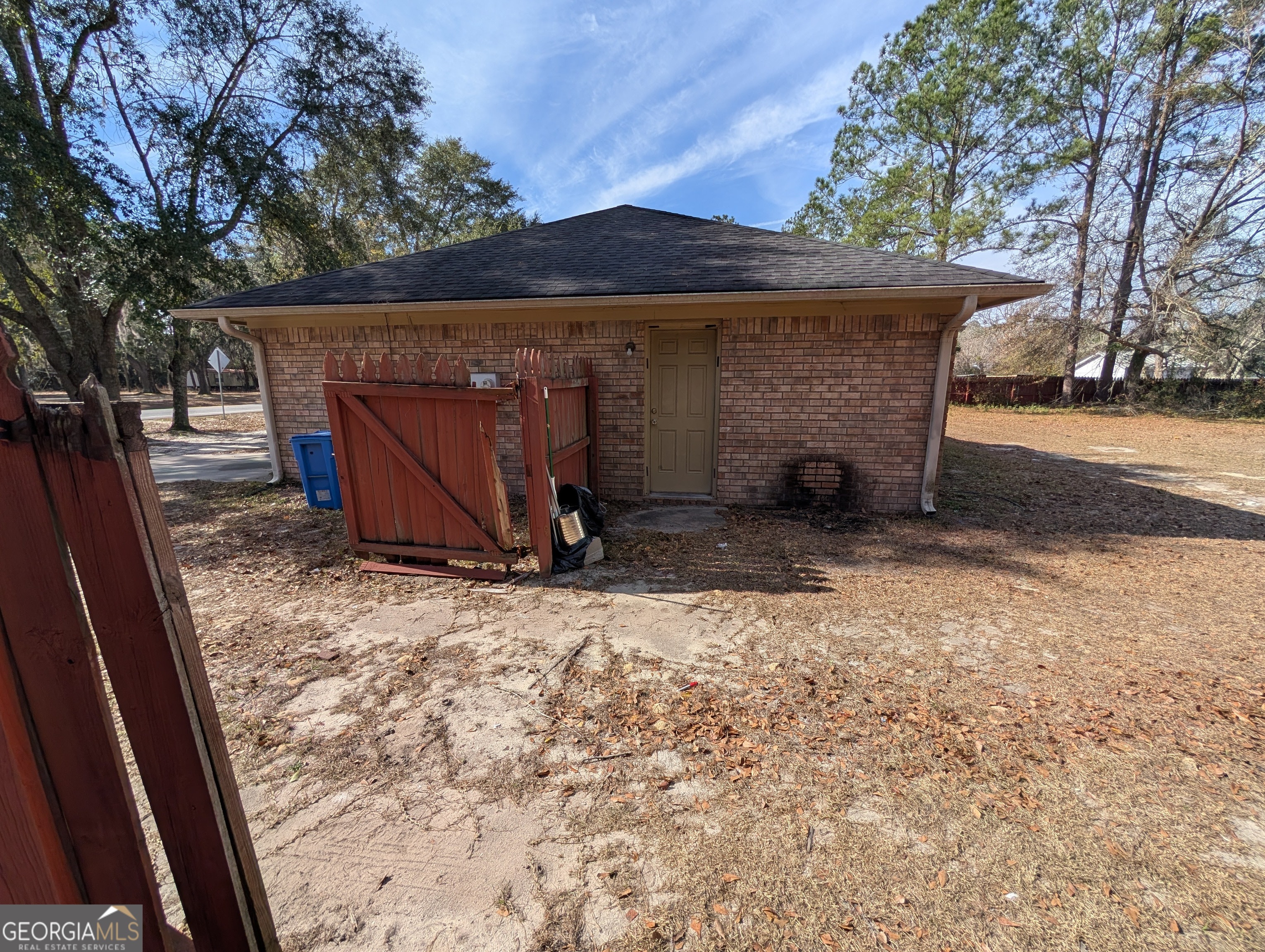 1934 Talmadge Road Allenhurst, GA 31301 - Photo 3 of 19 a view of a barn in the middle of a yard