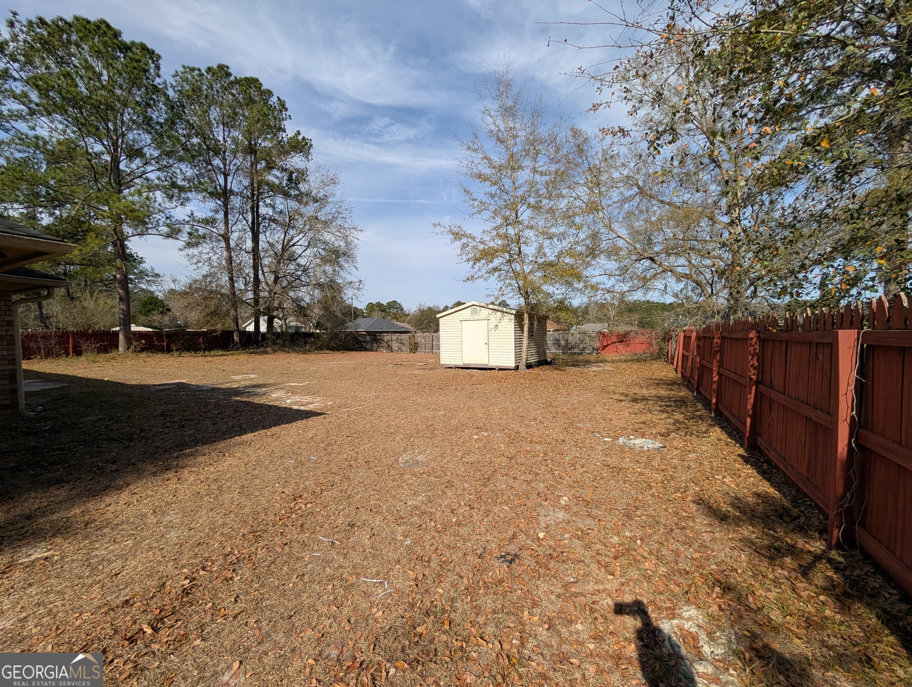1934 Talmadge Road Allenhurst, GA 31301 - Photo 4 of 19 a road view with large trees