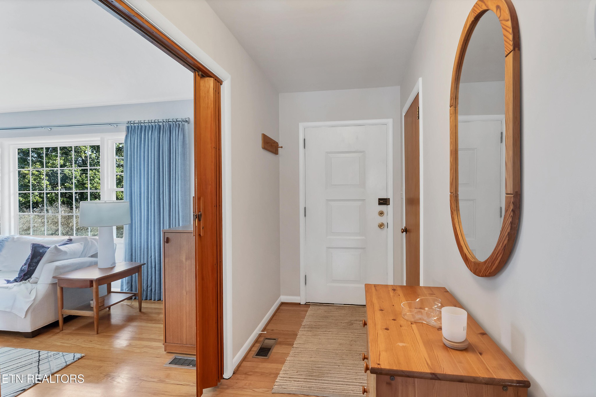 409 Bridge View Lane Knoxville, TN 37914 - Photo 12 of 37 a view of a bedroom with furniture and windows