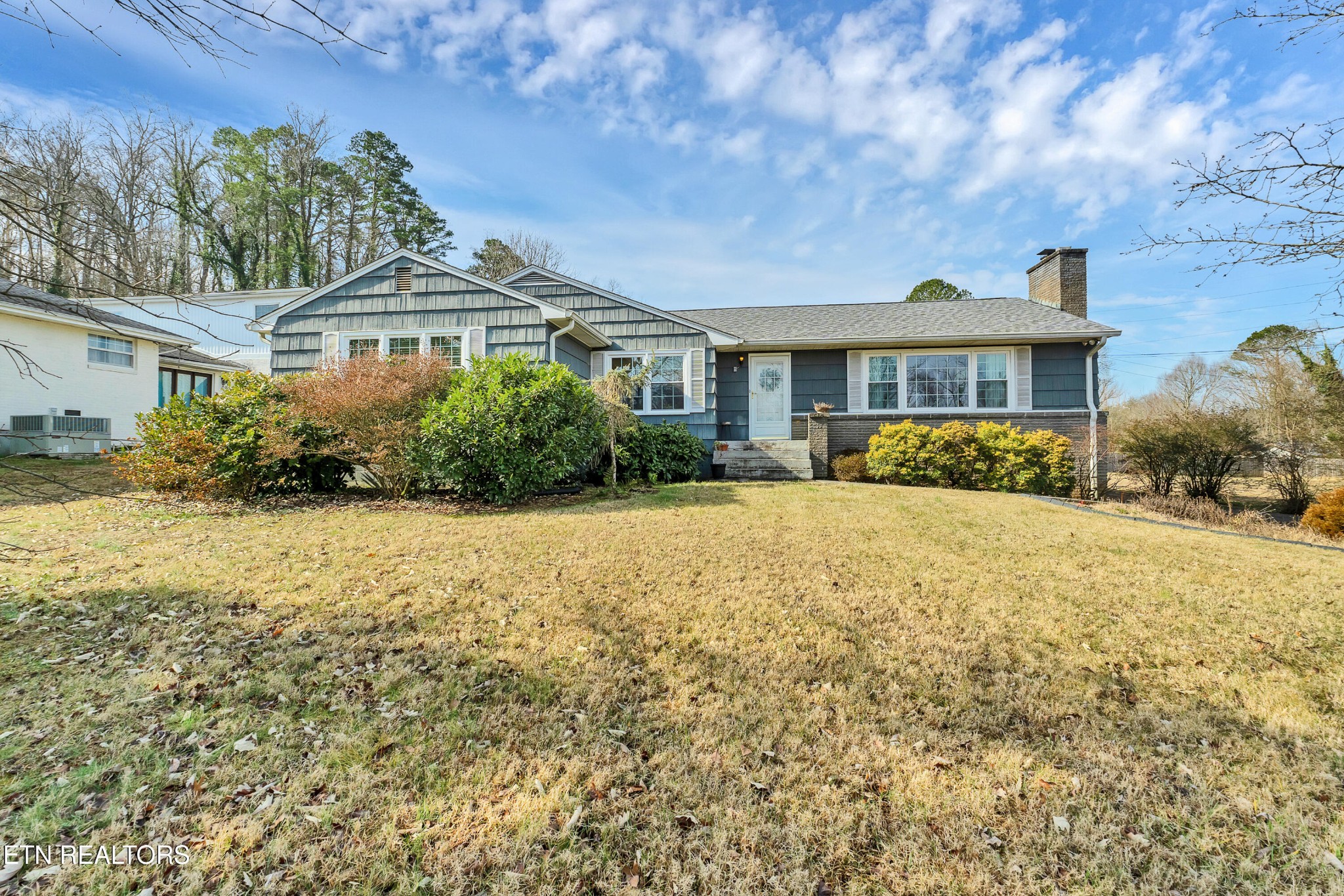 409 Bridge View Lane Knoxville, TN 37914 - Photo 29 of 37 a front view of a house with a yard
