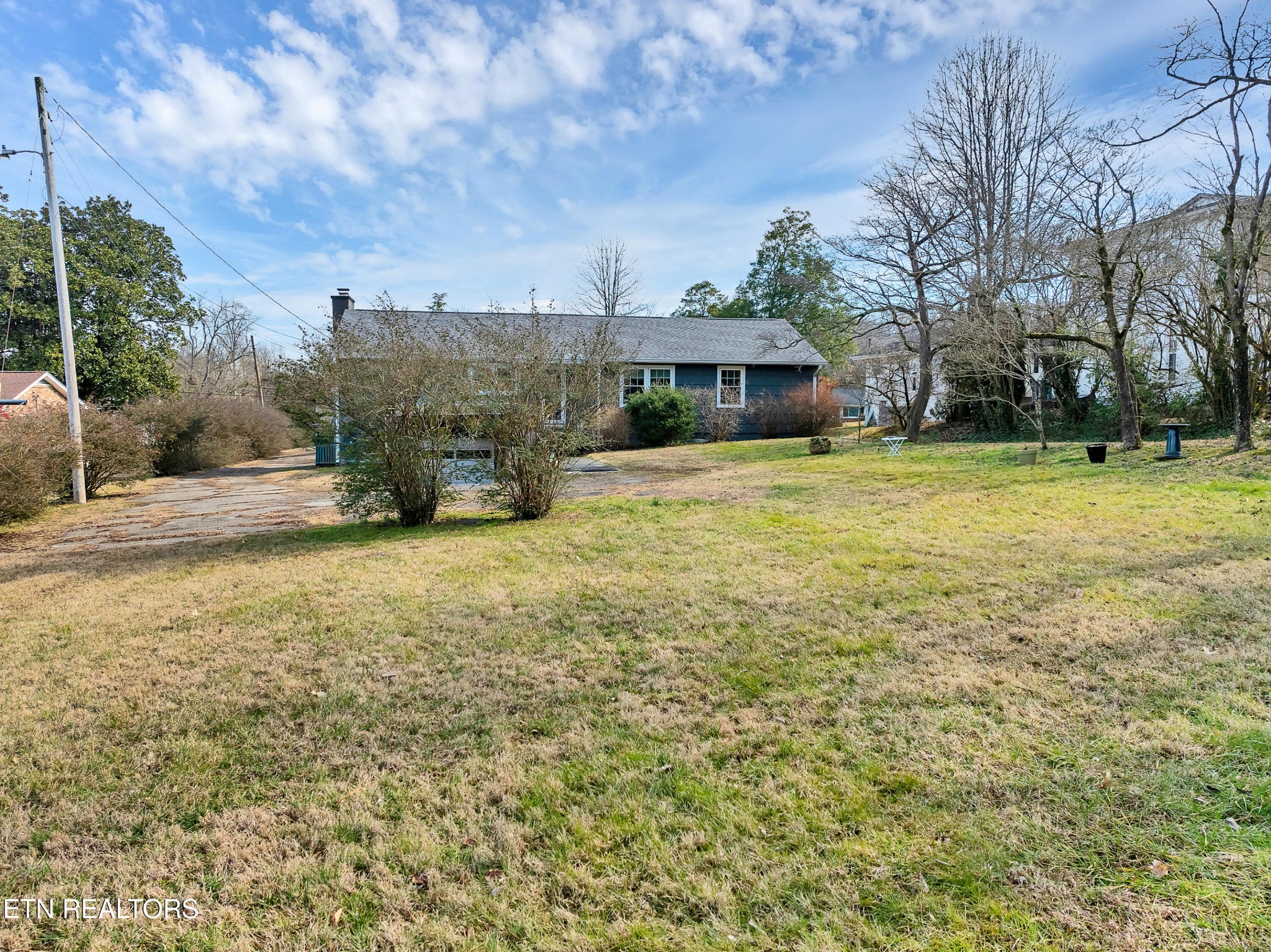 409 Bridge View Lane Knoxville, TN 37914 - Photo 34 of 37 a view of a house with a yard