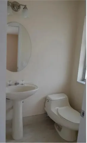 a bathroom with a sink and a toilet