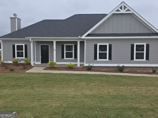 a swimming pool with outdoor seating