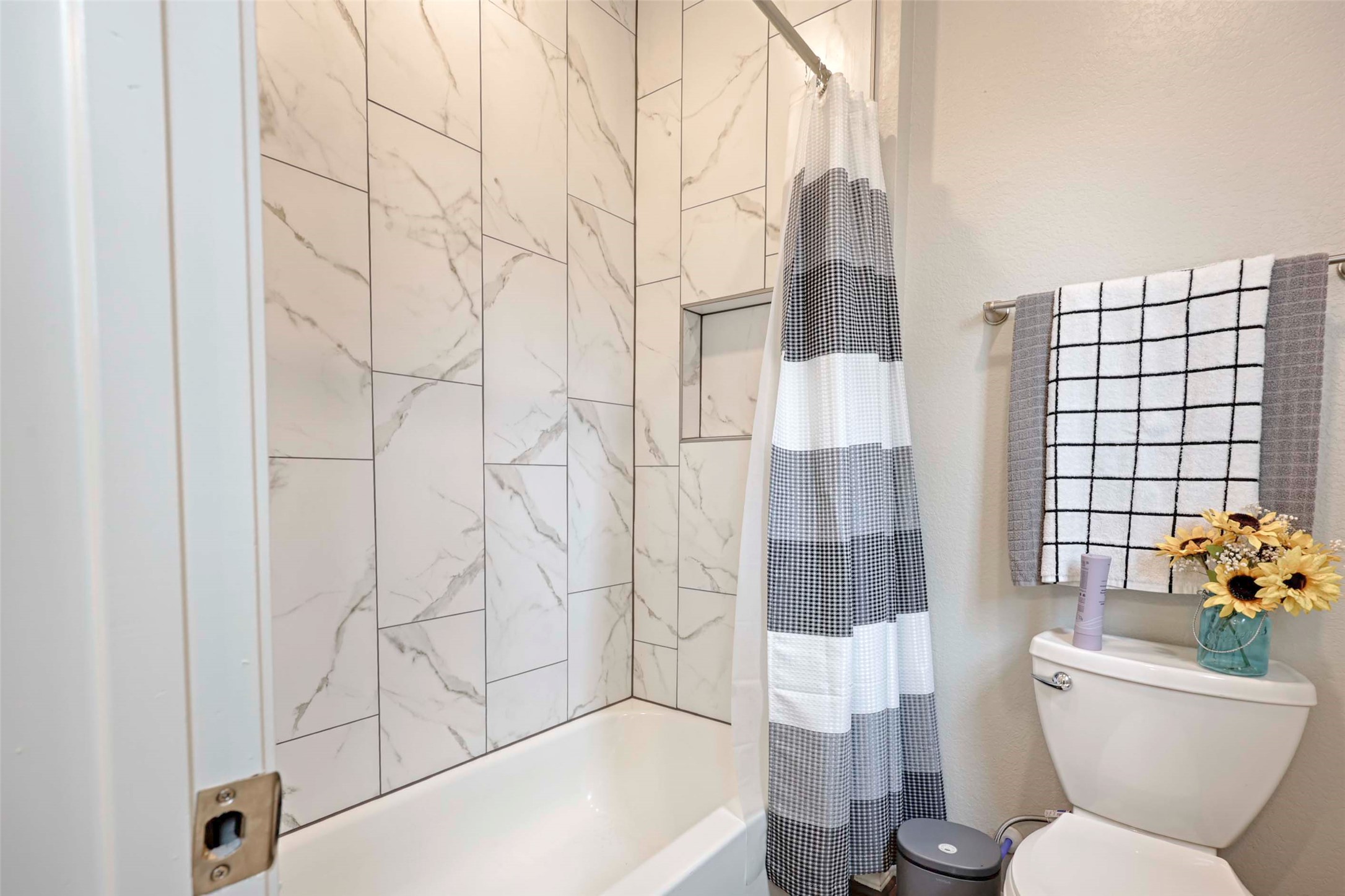 206 East Hinton Road Weimar, TX 78962 - Photo 16 of 22 Bathroom featuring toilet and shower / bath combo
