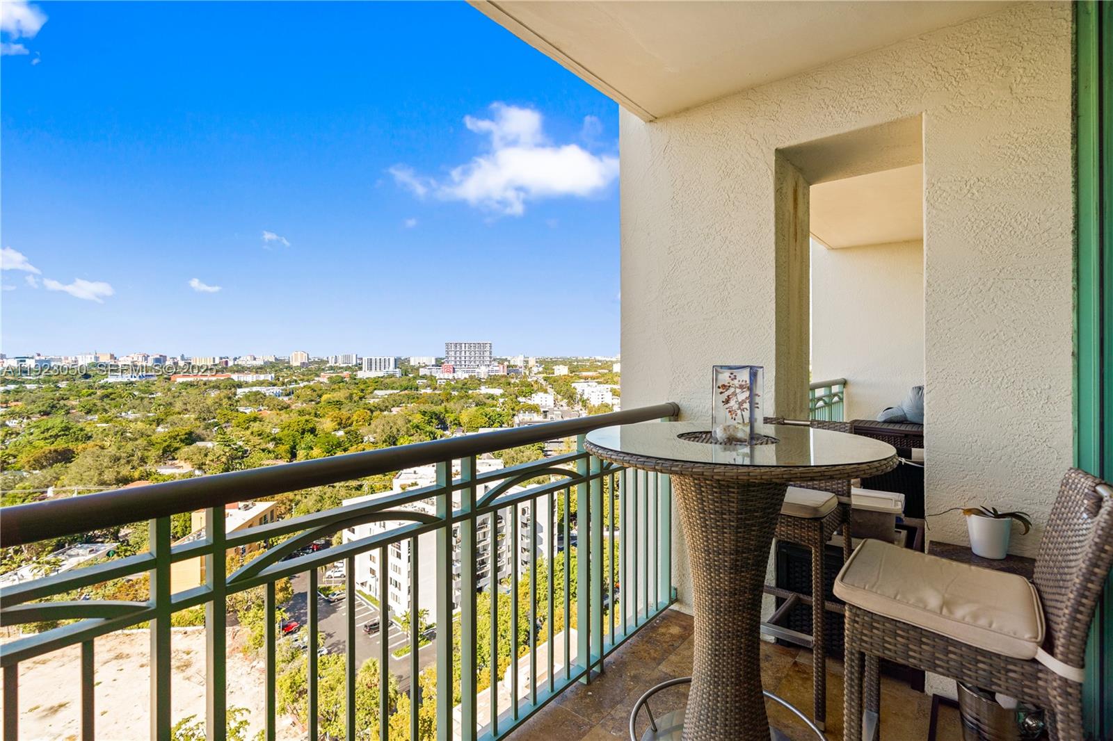 3350 Southwest 27th Avenue, Unit 1706 Coconut Grove, FL 33133 - Photo 11 of 32 a view of a city from a balcony