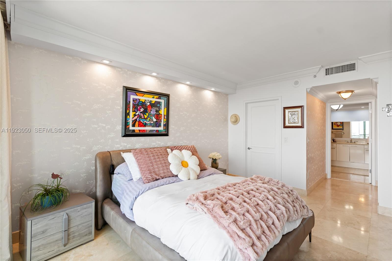 3350 Southwest 27th Avenue, Unit 1706 Coconut Grove, FL 33133 - Photo 17 of 32 a bedroom with a bed and a couch