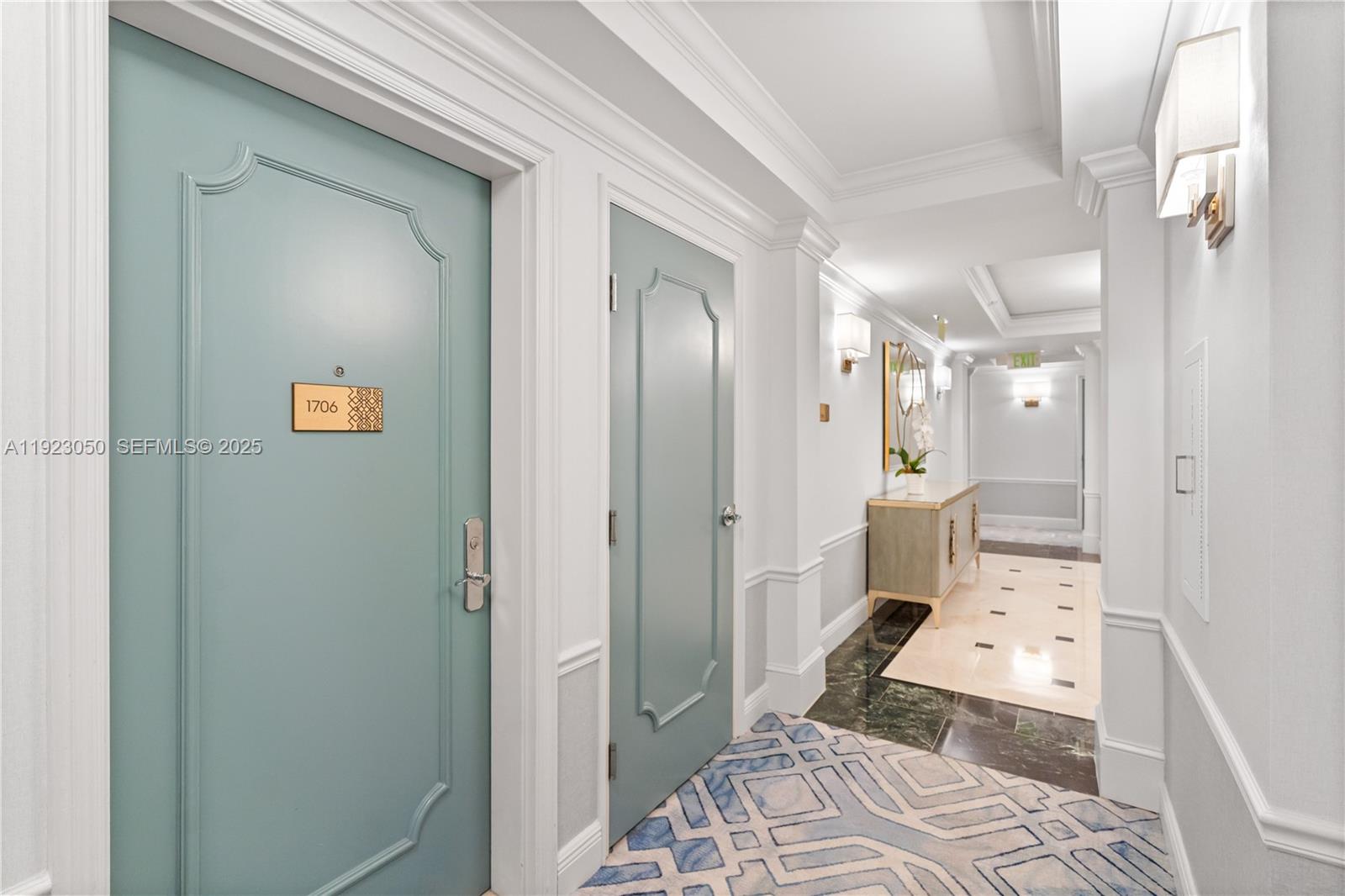 3350 Southwest 27th Avenue, Unit 1706 Coconut Grove, FL 33133 - Photo 23 of 32 a bathroom with a sink and a mirror