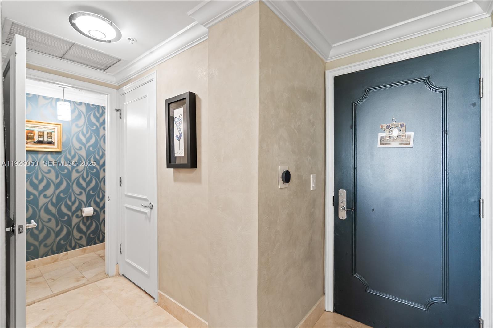 3350 Southwest 27th Avenue, Unit 1706 Coconut Grove, FL 33133 - Photo 25 of 32 a view of a hallway with wooden floor