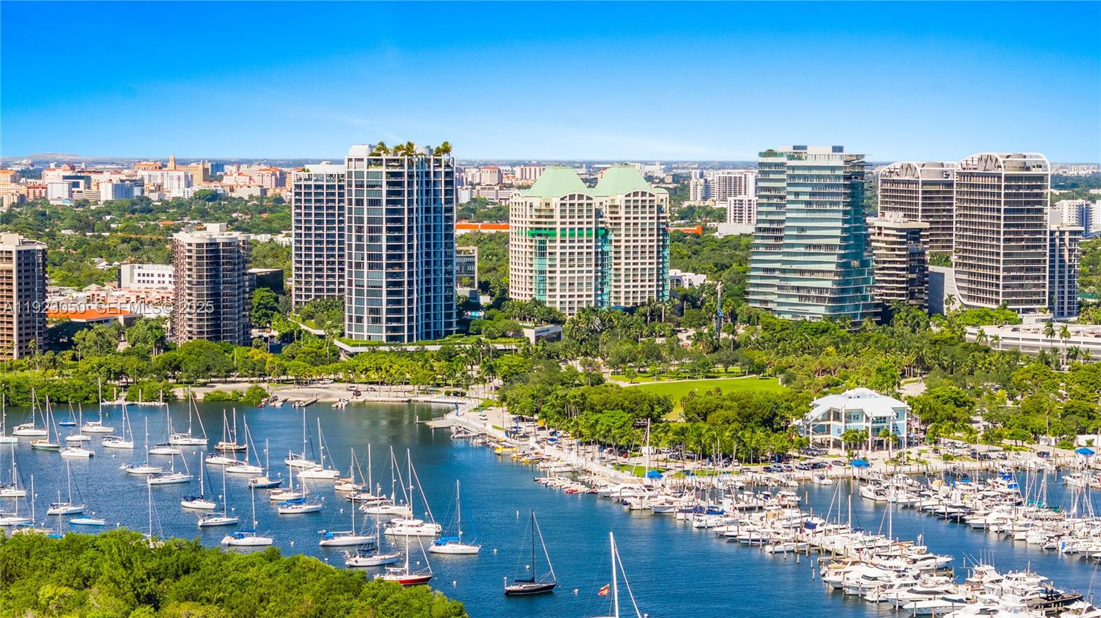 3350 Southwest 27th Avenue, Unit 1706 Coconut Grove, FL 33133 - Photo 30 of 32 a view of a city with tall buildings