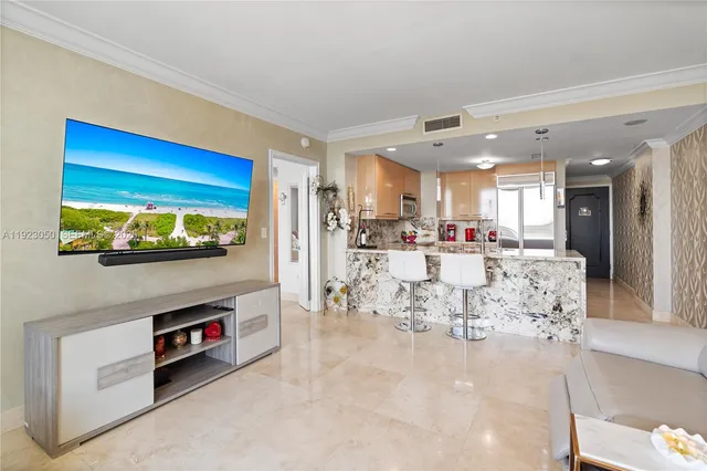 a view of kitchen with stainless steel appliances kitchen island
