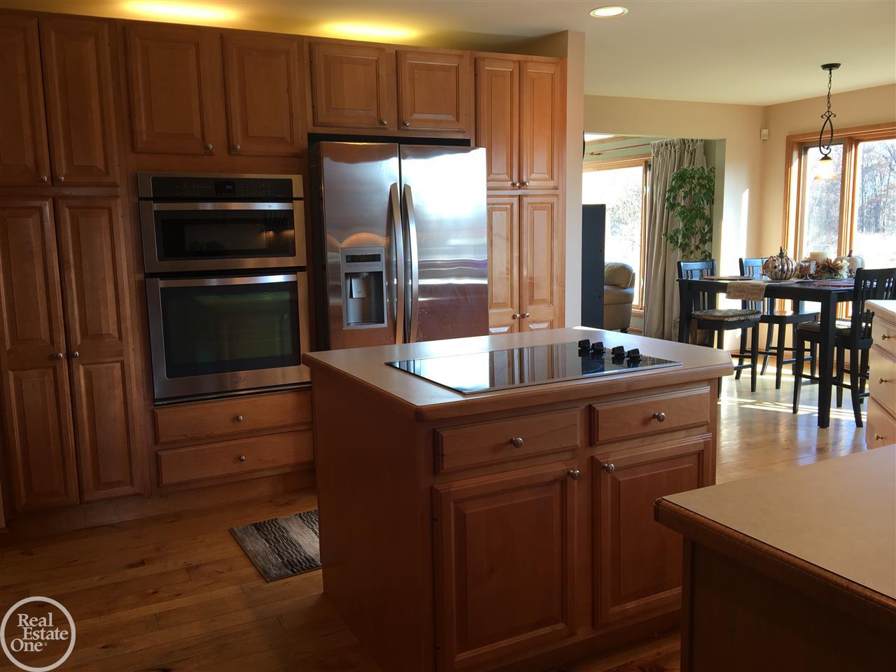 4213 Hosner Road Metamora, MI 48455 - Photo 17 of 57 Over and under-cabinet lighting