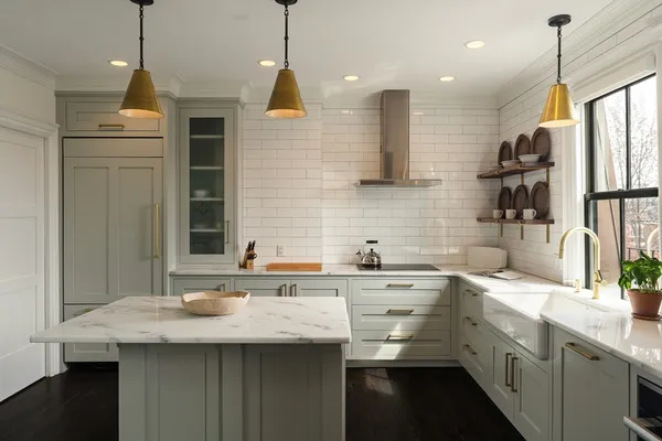 a kitchen with a sink stainless steel appliances and cabinets