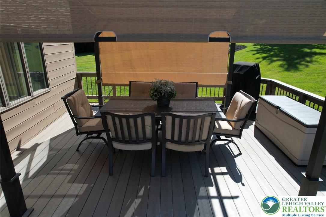 3470 Brodhead Road Bethlehem, PA 18020 - Photo 20 of 84 Relax in the open air on this ample outdoor deck, ideal for gatherings and enjoying the surrounding scenery.