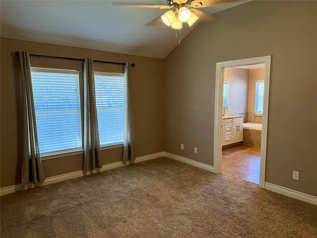 an empty room with a bathroom