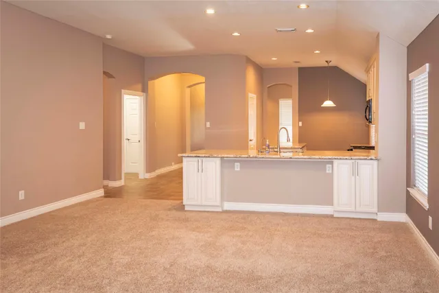 a view of a bathroom with a large window