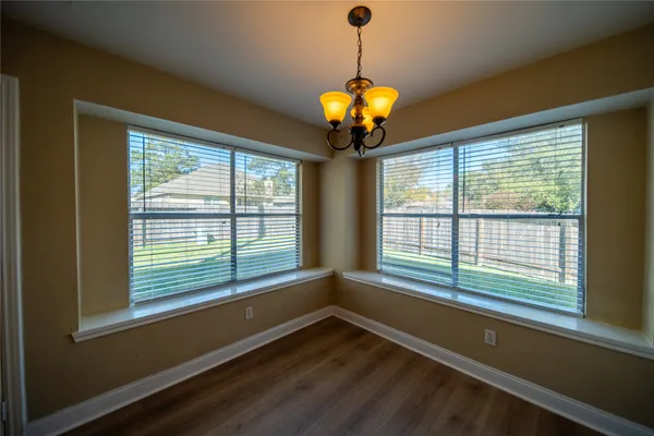 a view of a room with windows