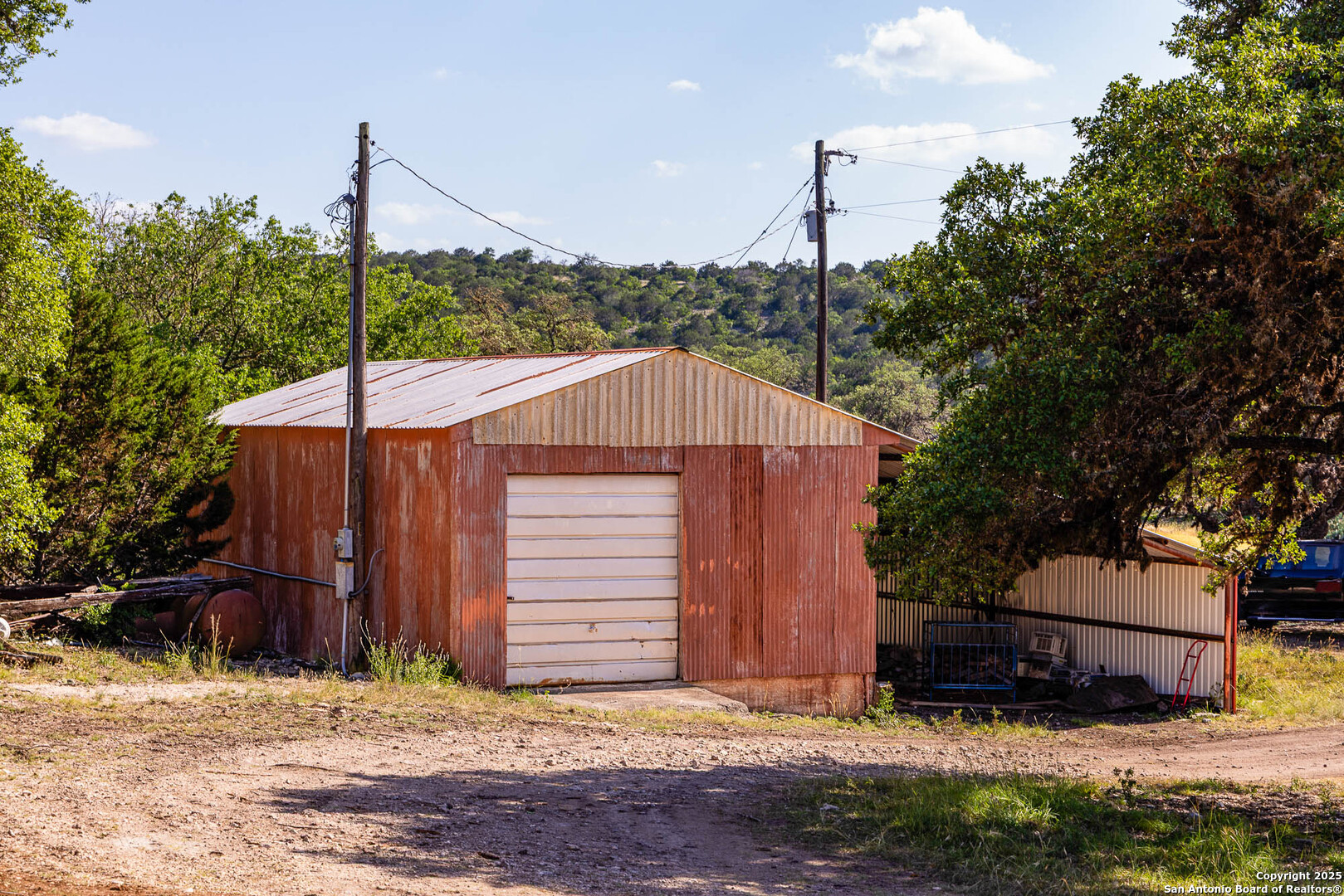 14910 Bullhead Road Barksdale, TX 78880 - Photo 33 of 50 a view of a house in the middle of a yard