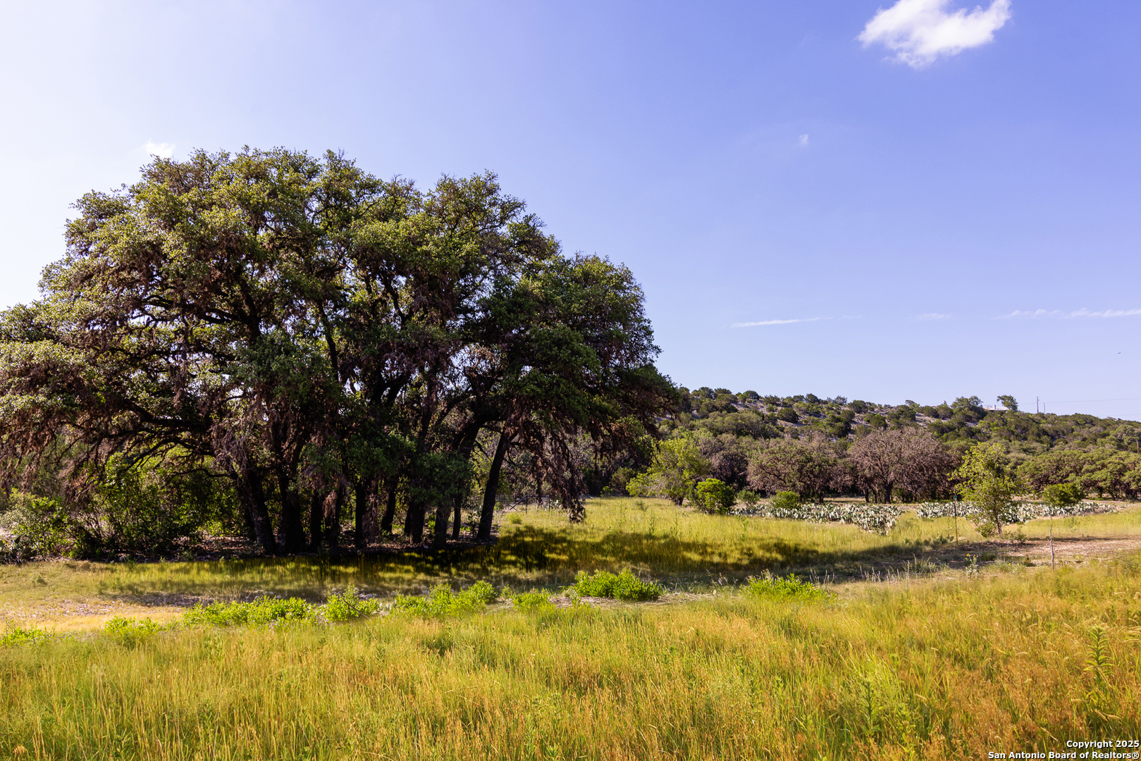 14910 Bullhead Road Barksdale, TX 78880 - Photo 37 of 50 a view of a swimming pool with an outdoor space and seating area