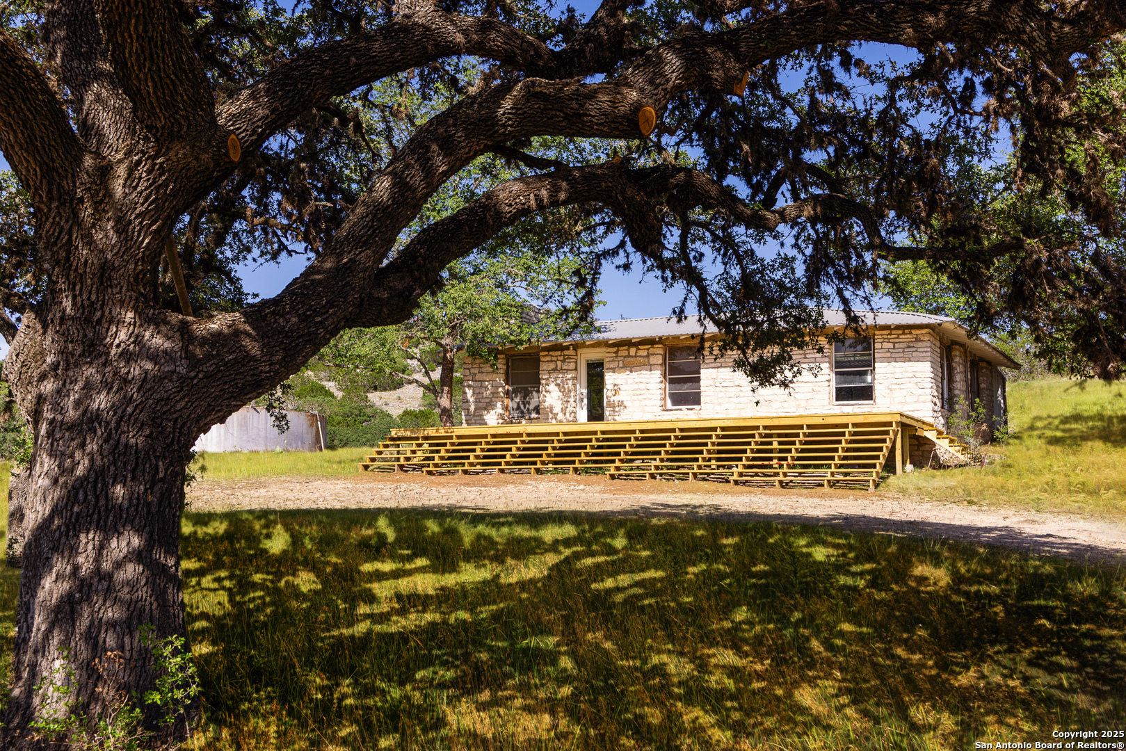 14910 Bullhead Road Barksdale, TX 78880 - Photo 5 of 50 a view of a house with a tree