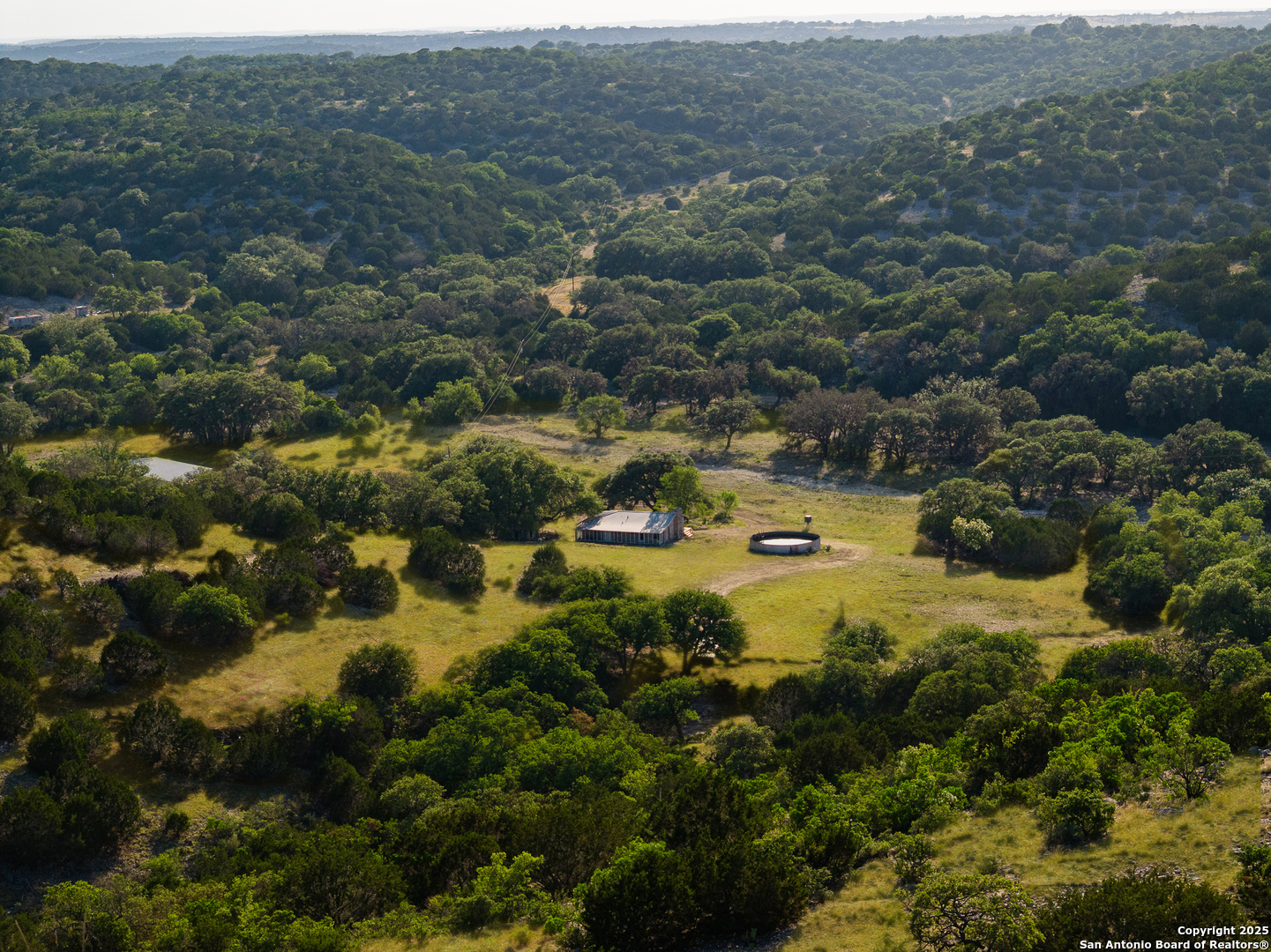 14910 Bullhead Road Barksdale, TX 78880 - Photo 8 of 50 an aerial view of residential houses with outdoor space and trees