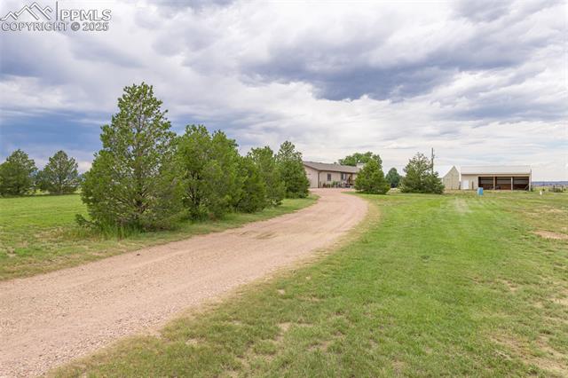 11170 Peaceful Valley Road Colorado Springs, CO 80925 - Photo 41 of 49 View of dirt / gravel road