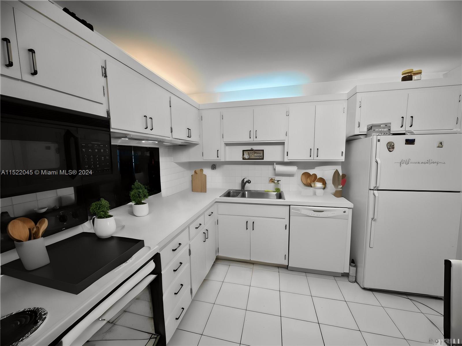 a kitchen with cabinets and appliances