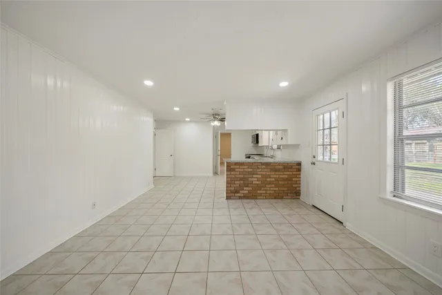 a large space with white cabinets