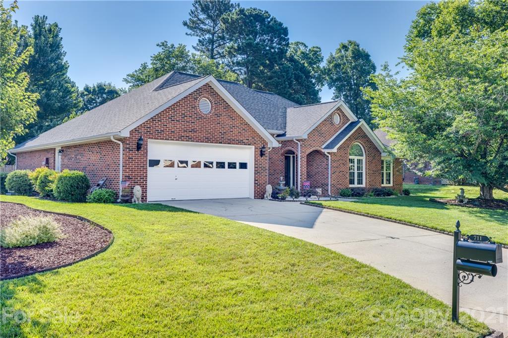 711 Monticello Drive Fort Mill, SC 29708 - Photo 1 of 45 a view of a house with yard and tree s