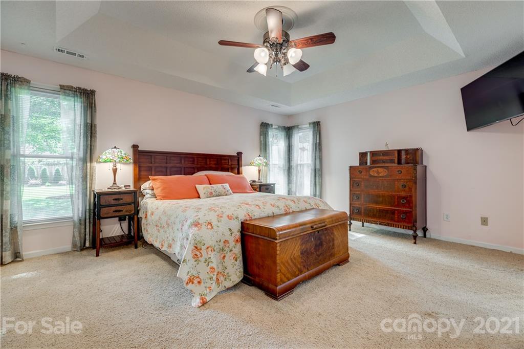711 Monticello Drive Fort Mill, SC 29708 - Photo 19 of 45 a bedroom with a bed and a television
