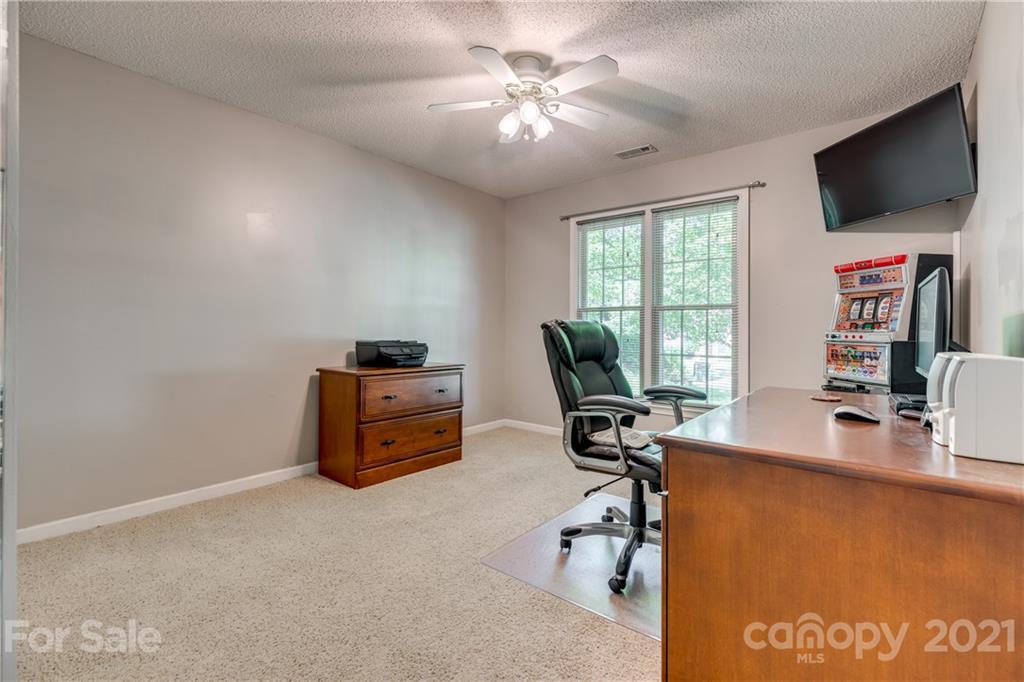 711 Monticello Drive Fort Mill, SC 29708 - Photo 29 of 45 a view of a workspace with furniture and a window