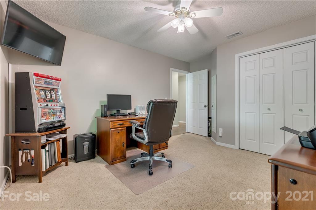 711 Monticello Drive Fort Mill, SC 29708 - Photo 30 of 45 a view of a workspace with furniture and a window