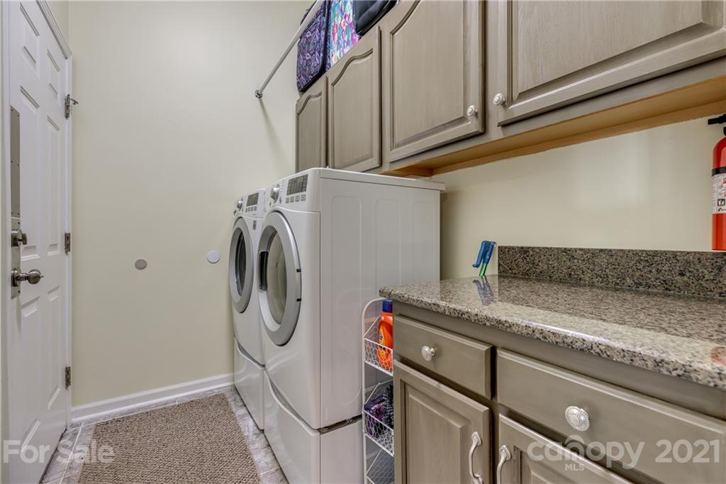 711 Monticello Drive Fort Mill, SC 29708 - Photo 32 of 45 a utility room with dryer and washer